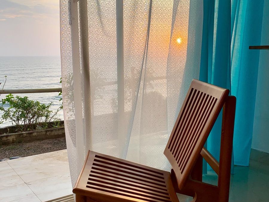 Sunset over the sea from a room at Nebo